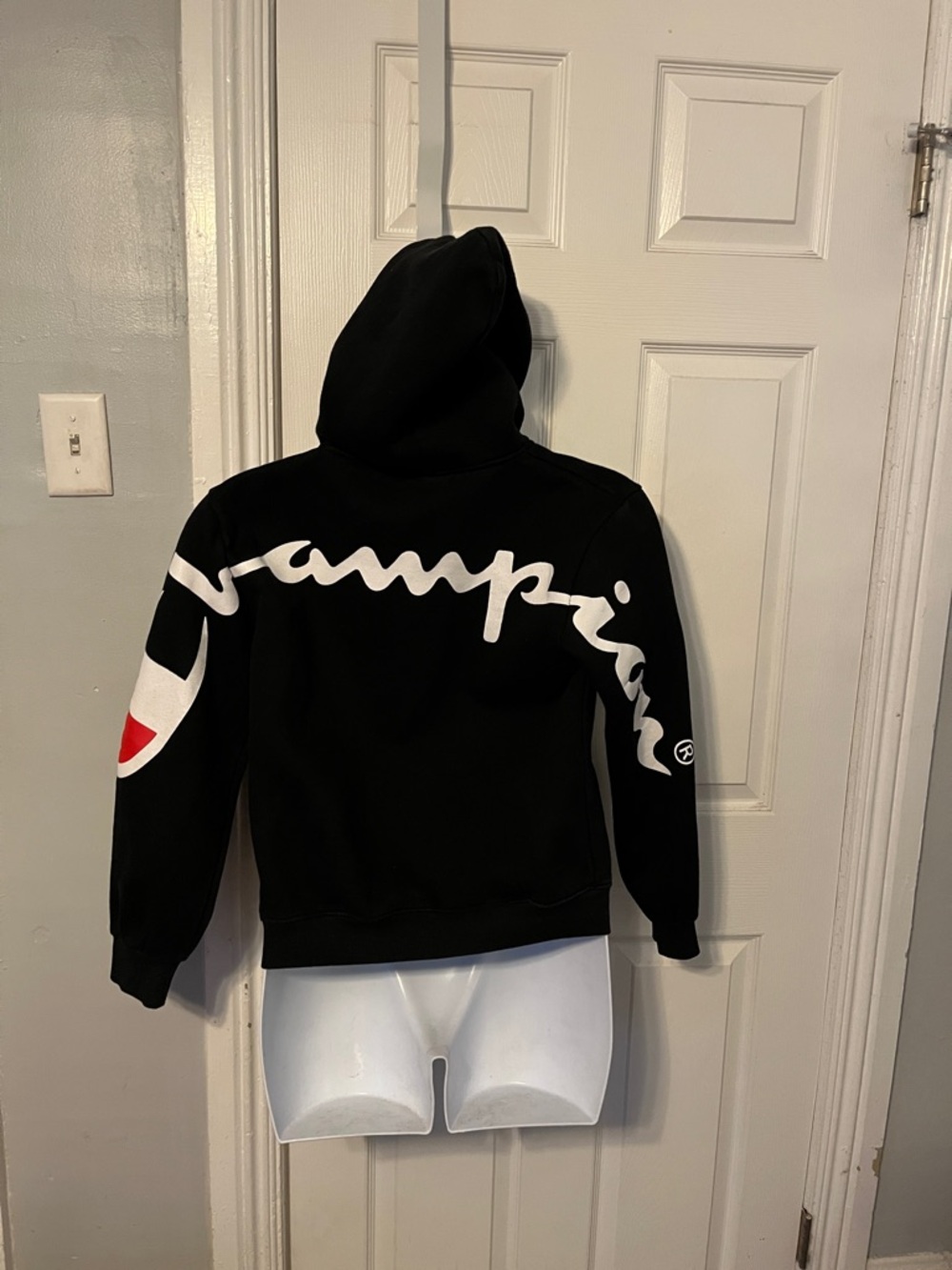 Vintage Champion Black Hoodie with Red & White Sleeve Emblem